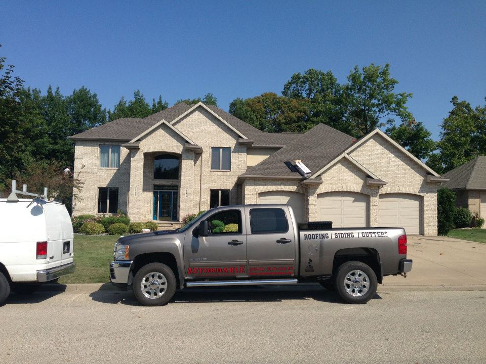 ACS Roofing with Truck